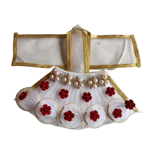 Decorative blouse with red floral and pearl embellishments on a white background